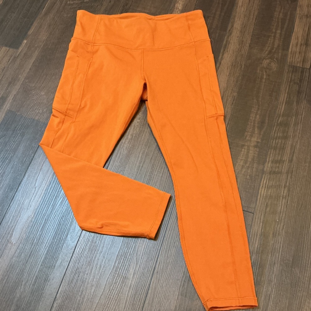 Athleta Ultimate Stash 7/8 Tight Orange High Rise Pocket Leggings Large Workout